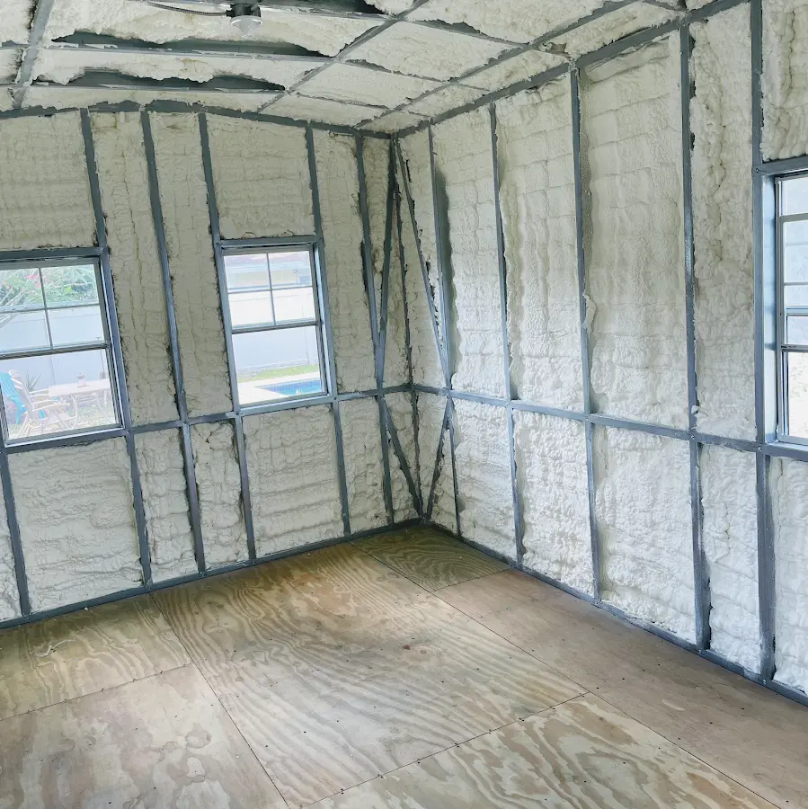 Closed-cell spray foam insulation applied to wall cavities in a residential project in Detroit